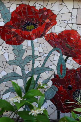 The mosaic tile work Kim Grant did on her Fluffy home, a year after her Vietnam veteran father's death.