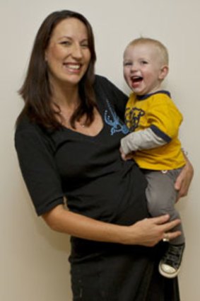 Taking time out for motherhood ... Tracy Higgisson with her son Jackson. She is expecting a second child in August.