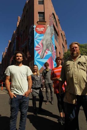 Inspirations: (from left) Dylan Demarchi, Juliet Rosser, street artist The Dirt, Sarah Howell and street artist byrd in front of the mural.