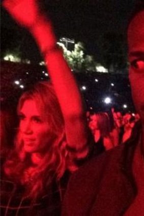 Not impressed: Marlon Wayans captured Delta Goodrem dancing at a Jay Z and Beyonce concert.