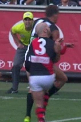 Collingwood's Clinton Young was offered a reprimand for this bump on Paul Chapman.