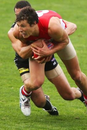 Kurt Tippett of the Swans wins the ball, but he was unable to help the Swans to victory in the match.