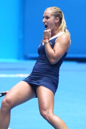Dominika Cibulkova rejoices after her win over Maria Sharapova.