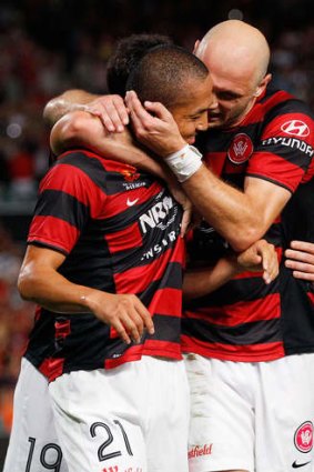 Shinji Ono of the Wanderers celebrates with team mate Dino Kresinger after scoring a penalty.