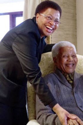 Rare appearance &#8230; the former president of South Africa, Nelson Mandela, and his wife Graca Machel receive the US Secretary of State, Hillary Clinton, at their home in Qunu.