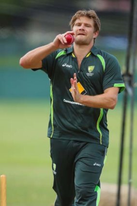 Shane Watson bowls in a nets session on Monday.