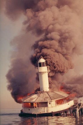 Point Gellibrand being burned after being struck by the Melbourne Trader.