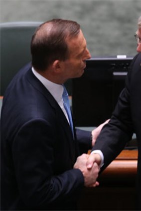 Let the battle begin: Tony Abbott congratulates Kevin Rudd on his return to the prime ministership on June 27.