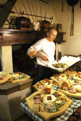 Chef Roberto di Martin at work at Locanda al Monastero, Rolle.