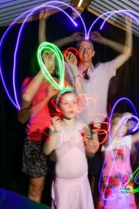 Light Up The Night: The McKeown family from Cammeray enjoy the Spectrum Playground.