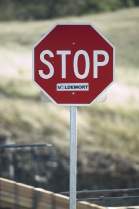Vandalised 'Stop' sign on Federal Highway off ramp to Horsepark Drive.