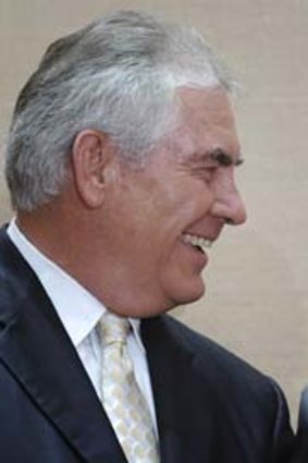 Exxon chief executive, Rex Tillerson, (left).