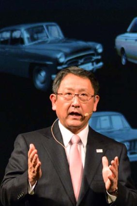 Bearer of bad news: Akio Toyoda addresses the company's 2500 workers.