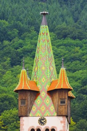 The distinct, pointed top of a regional bell tower.