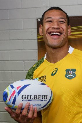 New look: Israel Folau with the new Wallabies World Cup jersey launched in Sydney on Wednesday.