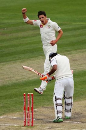 Out ... Starc sends Karunaratne on his way back.