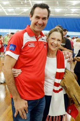 Fan base: Sydney Swans team of the century player Tony Morwood with long-time club fan Philippa Power.