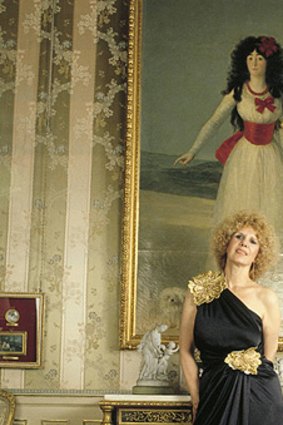 A younger Duchess of Alba  with a painting by Goya hanging in her Liria Palace.