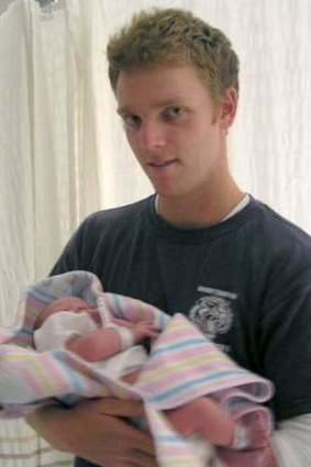Mathew Hopkins with his new born son Alex.