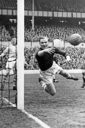 Pride and prejudice: Goalkeeper Bert Trautmann in action for Manchester City in 1956.