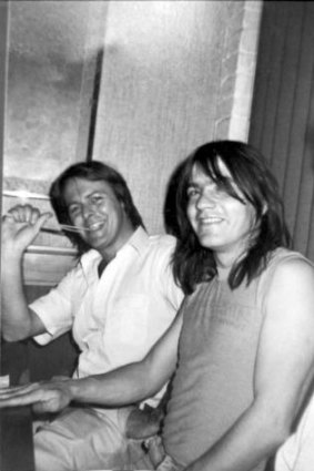 Malcolm Young (right), from AC/DC, with now deceased rock manager Crispin Dye.