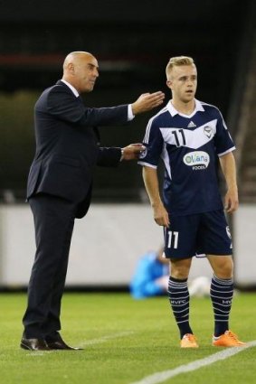 Moving forward: Kevin Muscat with Connor Pain.