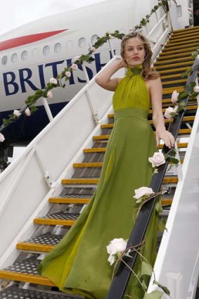 Launch: Georgia May Jagger poses on steps leading up to a new British Airways 777-700ER aircraft at Sydney Airport.