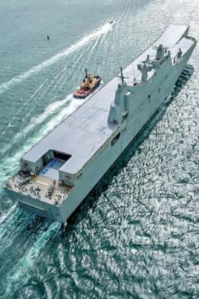 Massive flight deck: HMAS Canberra has the capacity to carry 16 helicopters.