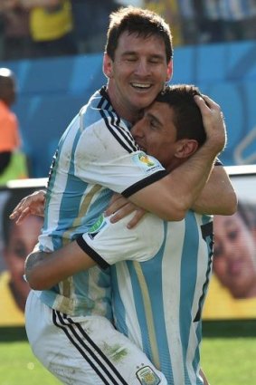 Argentinian Angel Di Maria (right) celebrates a World Cup goal. 