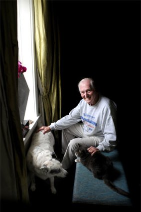 Courtenay at home with his beloved pets earlier this year.