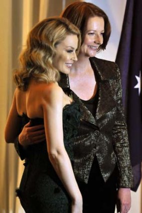 Kylie Minogue and Prime Minister Julia Gillard attend a fund raising dinner for the victims of tsunami and massive earthquake in Tokyo.