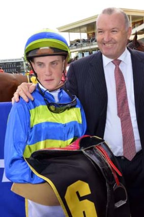 Trainer David Hayes and apprentice Chad Schofield.