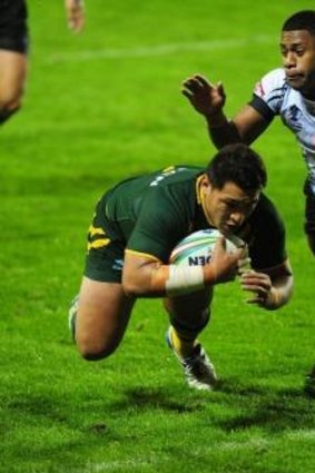Josh Papalii scores a try for Australia against Fiji during last year's world cup.