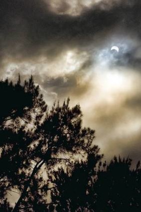 Partial eclipse viewed in Canberra. Photo sent in by Oscar R Camara of Lyneham.