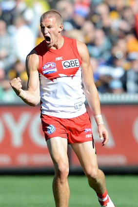 Sam Reid celebrates a goal.