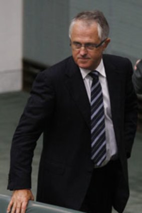 Political crime ... Malcolm Turnbull crosses the floor to vote with the government.