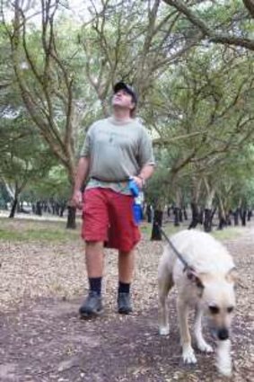 Ben Roberts and his dog Ralph enjoy a stroll through the historic cork oak plantation