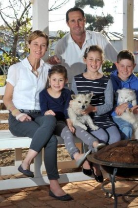 Geoff and Kim Hunt with their children Phoebe (left), Mia and Fletcher.
