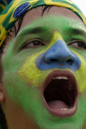 A protester in Rio chants anti-government slogans.