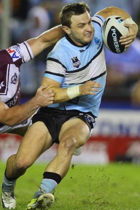 Down but not out ... Nathan Gardner tore his anterior cruciate ligament in the Sharks 12-0 defeat of the Dragons.