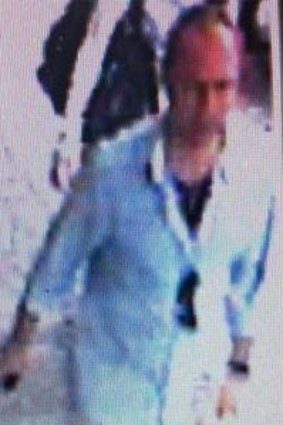 CCTV images of a man police want to speak to.