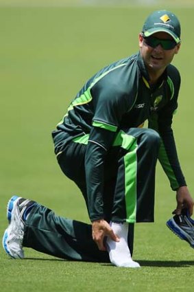 Michael Clarke appeared to have rolled an ankle.