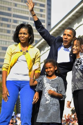 Incoming US President Barack Obama with his wife, Michelle, and daughters Malia, 10, and Sasha, 7, on the presidential campaign hustings.