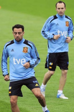 Barca boys &#8230; Xavi, left, and Andres Iniesta in training.