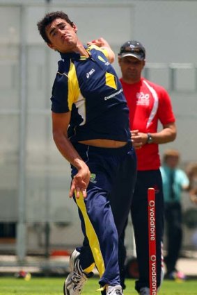 Mitchell Starc sends a delivery down during the nets session.