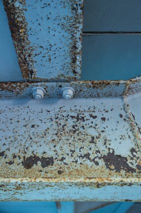 Rust on the steelwork inside the stadium.