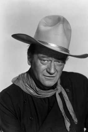 John Wayne, seen here in 1960, was famous for playing tough cowboys and soldiers.