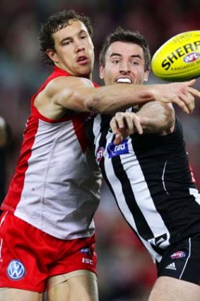 Sydney's Shane Mumford takes on Darren Jolly.