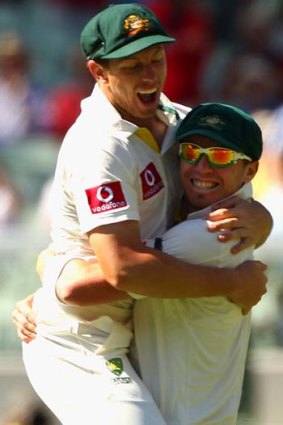 Jumping for joy: Peter Siddle (right) and James Pattinson.