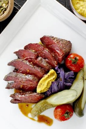 Soft and lightly smoky ... hot-spiced pastrami with smoked tomatoes, pickles and mustard.
